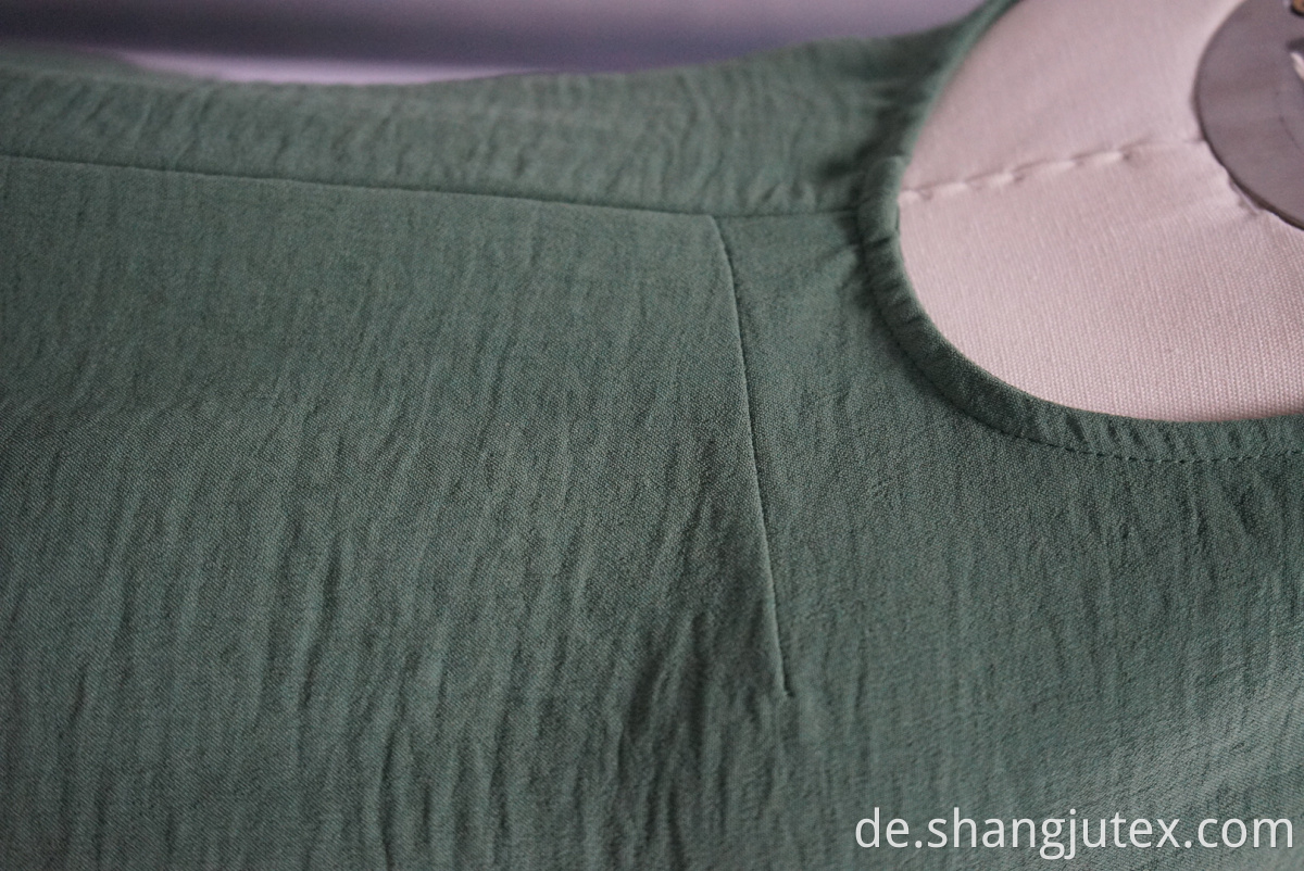 Farbe grün des Frauen -Tops color green of women's top